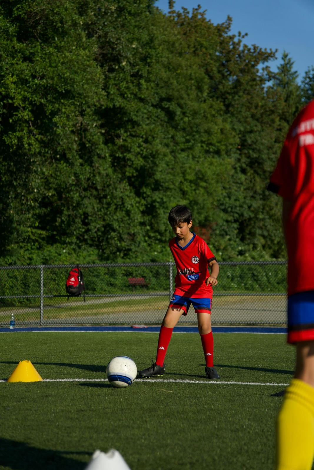 Group football training session at Elite Academy